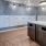 a kitchen with white cabinets